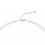 Adjustable silver clasp and extension chain detail of beaded necklace