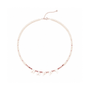 Alternating pink tourmaline and freshwater pearl bead texture close-up