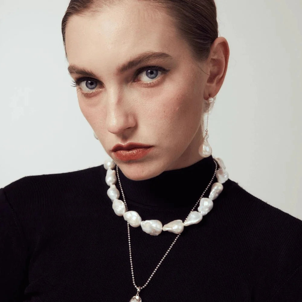 Luisy | White Baroque Pearl 18k Gold Drop Earrings model view