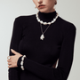 Oversized baroque pearl bracelet styling look