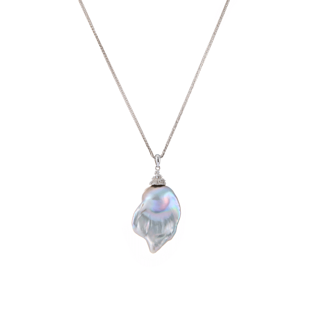 Isolated close-up of gray baroque pearl pendant and chai