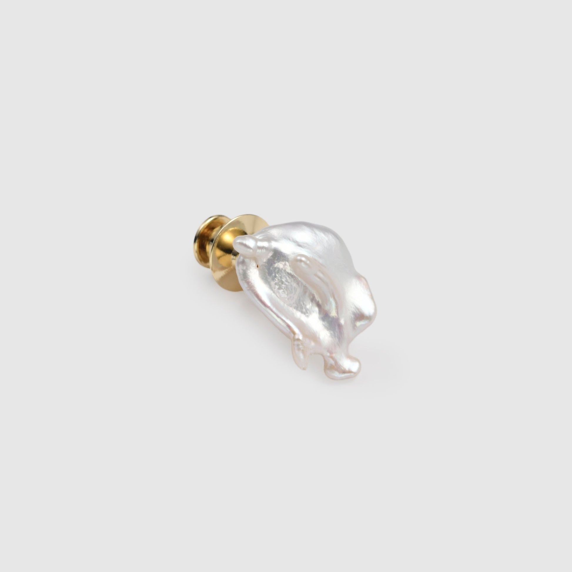 Close-up view of the sculptural texture of antique-style baroque jewelry pin