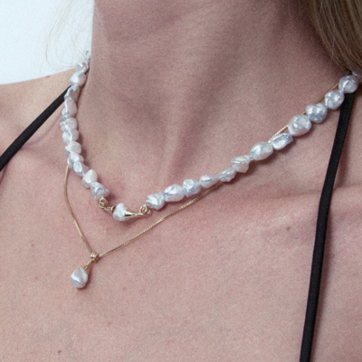 Pendentif perle Keshi bleue