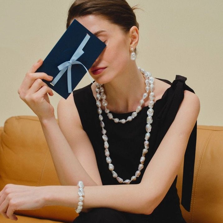 Bold statement baroque pearl jewelry set on model
