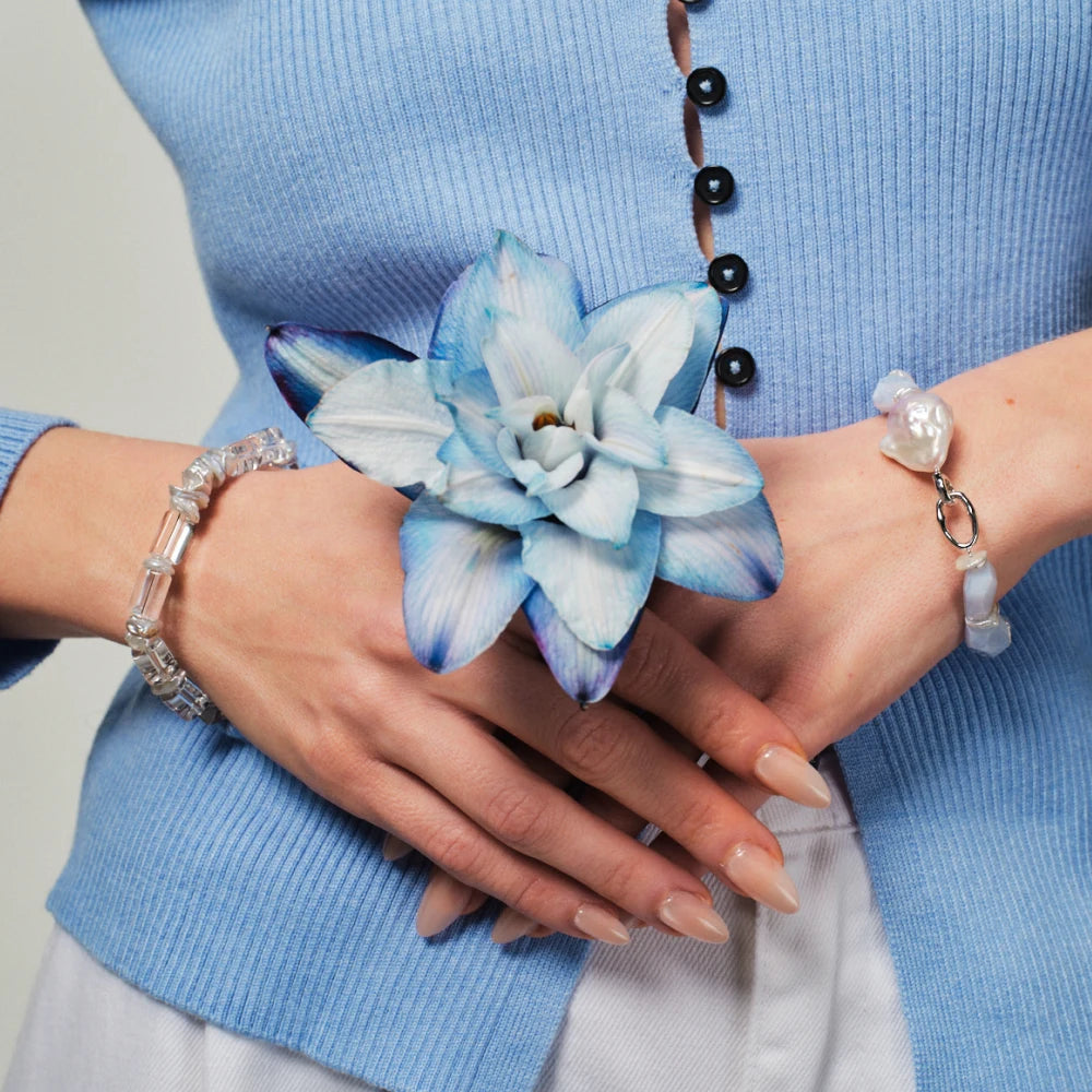 Celeste crystal pearl bracelet styled with casual blue outfit