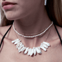 White pearl and gold layered necklaces stacking for everyday wear