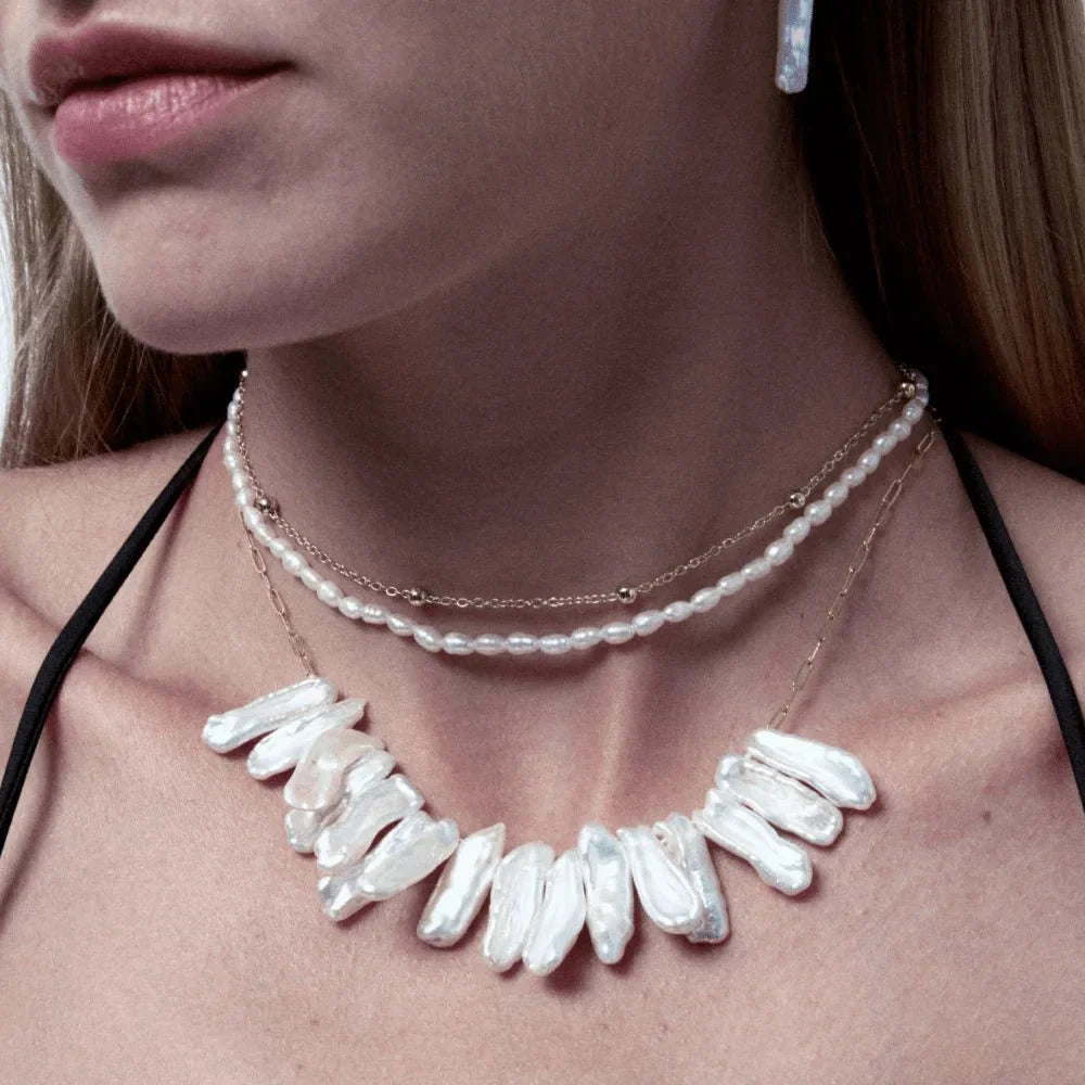 Celia | White Oval Baroque Pearl 18k Gold Layered Necklace model view