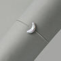 Close-up of crescent moon baroque pearl texture and luster