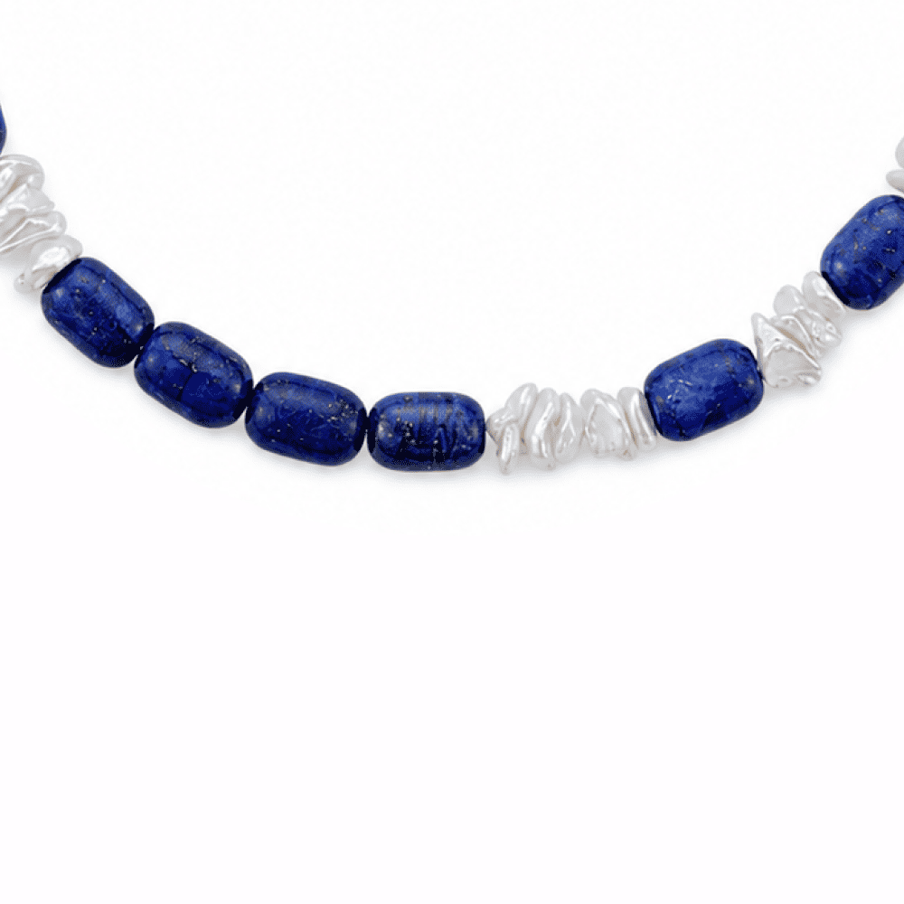 Close-up of lapis lazuli and baroque pearl texture on necklace