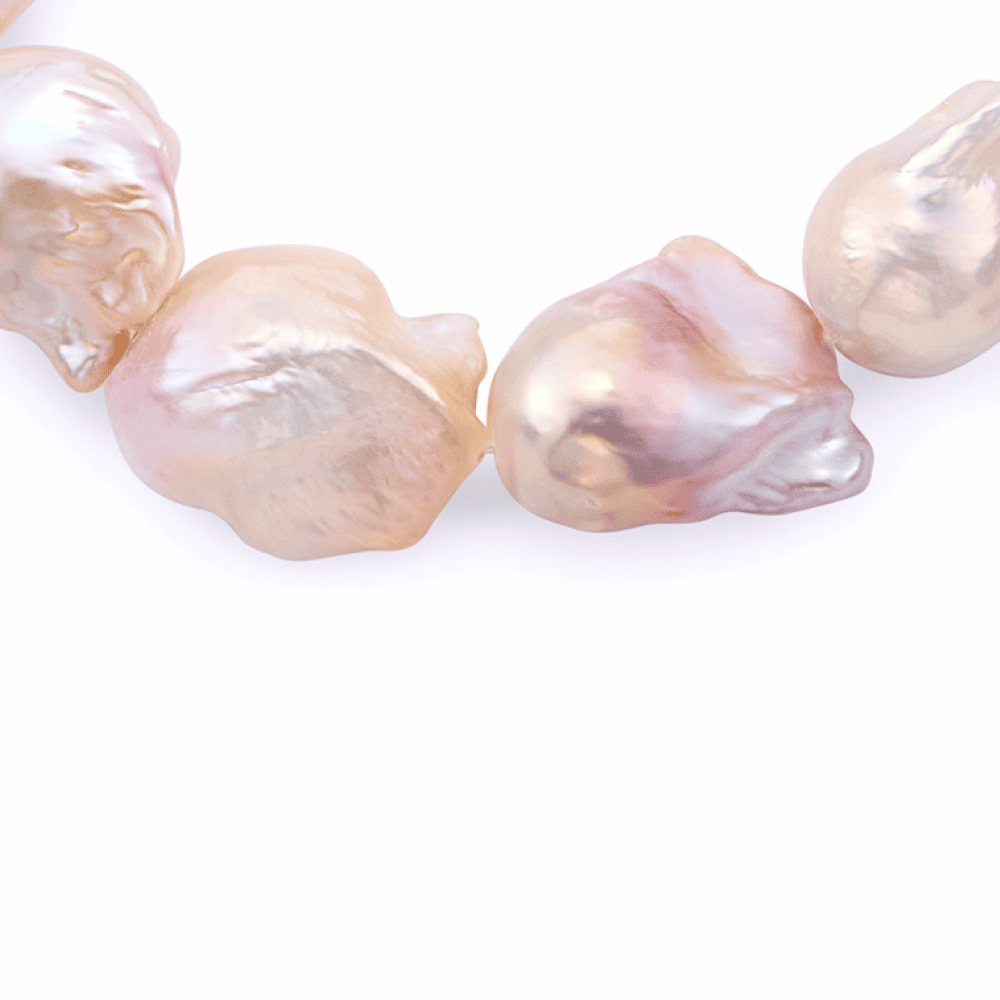 Close-up texture of pink irregular freshwater baroque pearls bracelet