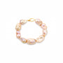 Close up of 15–24mm golden baroque pearls with pink-gold luster