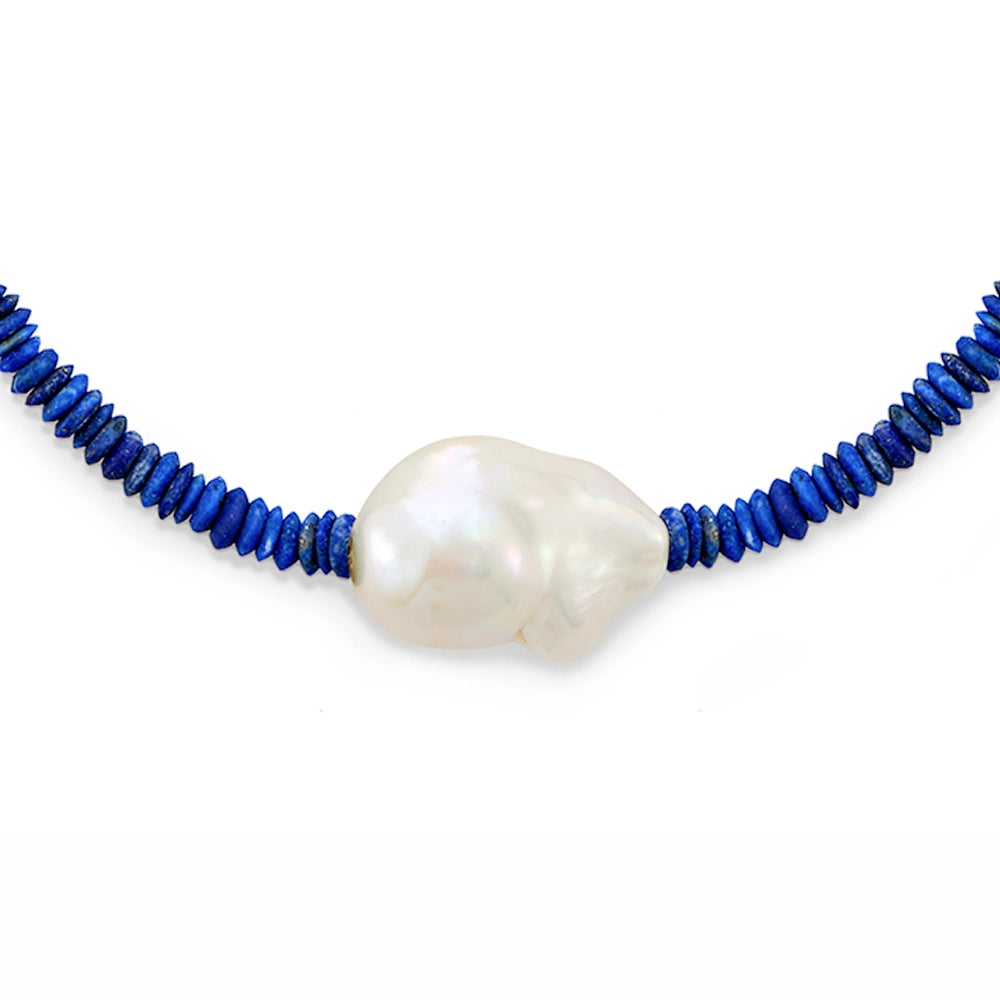 Close up of 18–24mm baroque pearl and deep blue lapis lazuli beads