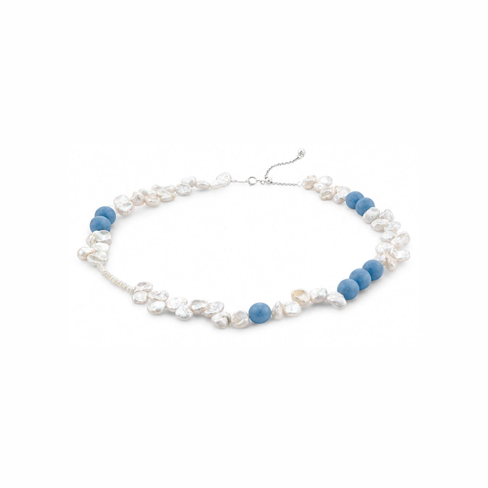 Close up of blue apatite beads and white keshi pearl beads