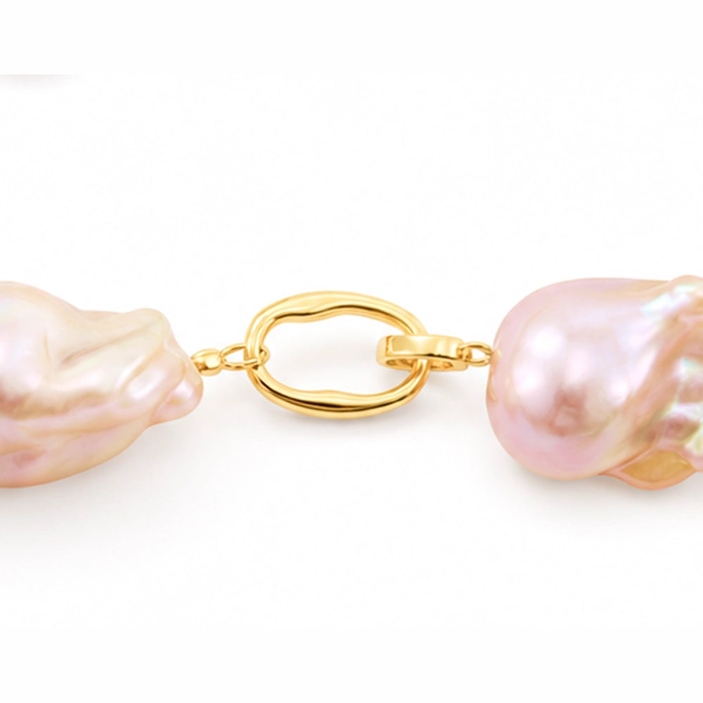 Close up of golden baroque pearls bracelet 18k gold-plated clasp