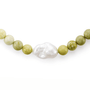Close up of grand baroque pearl centrepiece and green serpentine beads