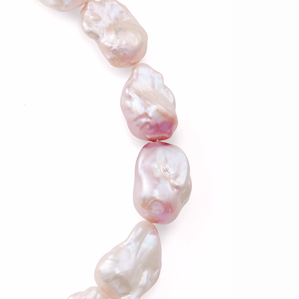 Close up of pink irregular freshwater baroque pearls