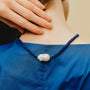 Coral pearl lapis necklace styled with blue casual outfit