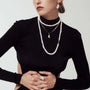 Olea | White Oval Baroque Pearl Silver Necklace model view