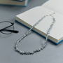 Close-up of blue gray iridescent luster on keshi baroque pearls