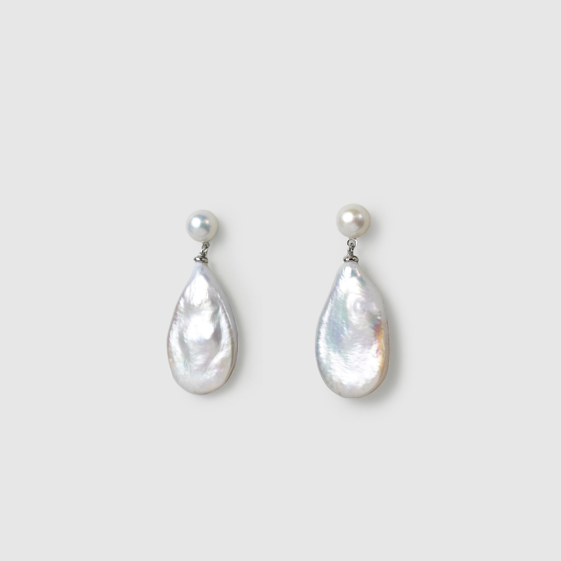Elegant cascading freshwater pearl drop earrings close up