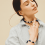 Model wearing lapis pearl necklace with smart casual outfit shirt