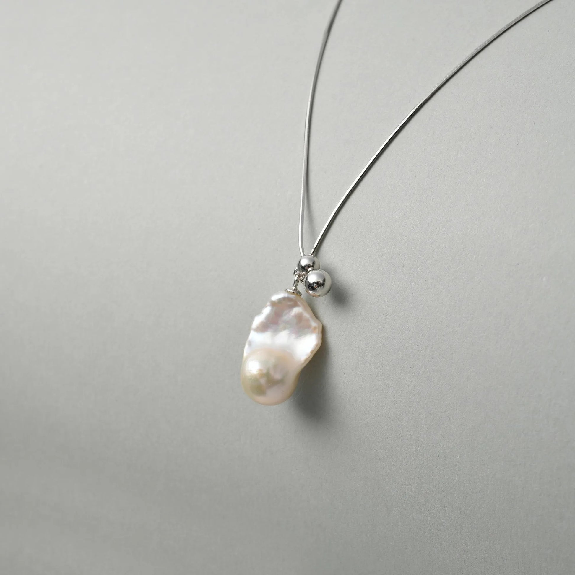 Sacra | White Baroque Pearl Silver Orb Pendant