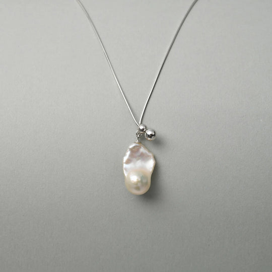 Sacra | White Baroque Pearl Silver Orb Pendant