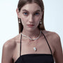 Stello sculptural pearl earrings model view