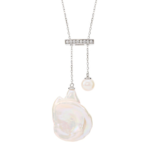 Clean white background close-up of sterling silver baroque pearl drop Y-shape pendant , thin polished silver chain paired with one large natural irregular white baroque pearl focal pendant