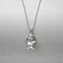 close-up-of-gray-baroque-pearl-with-silver-frame-setting-organic-curves