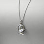 close-up-of-gray-baroque-pearl-with-silver-frame-setting-organic-curves