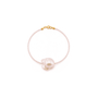 Soft matte pink beaded strand texture close-up of baroque pearl bracelet
