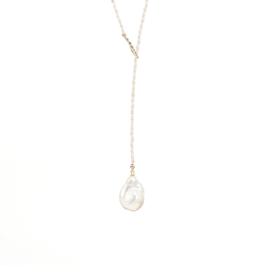 Solstice Drop Y-shaped baroque pearl necklace with 18k gold accents for women worldwide