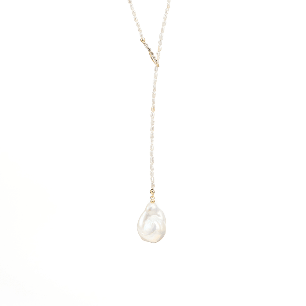 Solstice Drop Y-shaped baroque pearl necklace with 18k gold accents for women worldwide