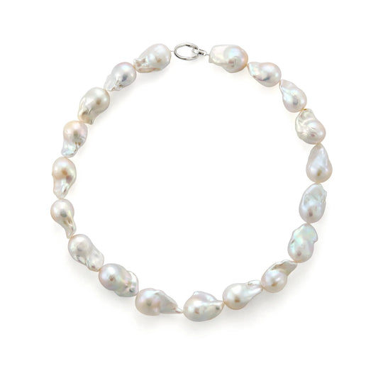 Top-down flat product shot of full sterling silver large baroque pearl choker, assorted irregular white freshwater pearls with lobster clasp