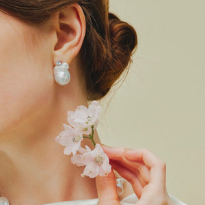 Sterling silver soft lustre large baroque pearl earring closeup