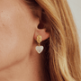 gold dangle heart earrings with hammered metal texture tarnish resistant