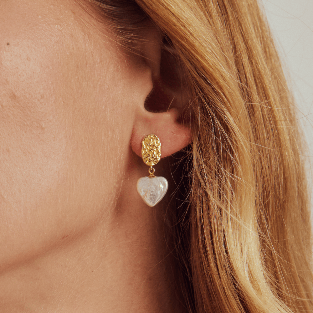 gold dangle heart earrings with hammered metal texture tarnish resistant