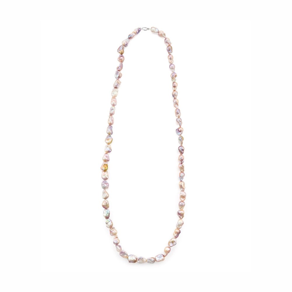 Vertical overhead minimal studio shot of full single strand purple baroque pearl necklace, uniform irregular pearl beads arranged on plain white backdrop