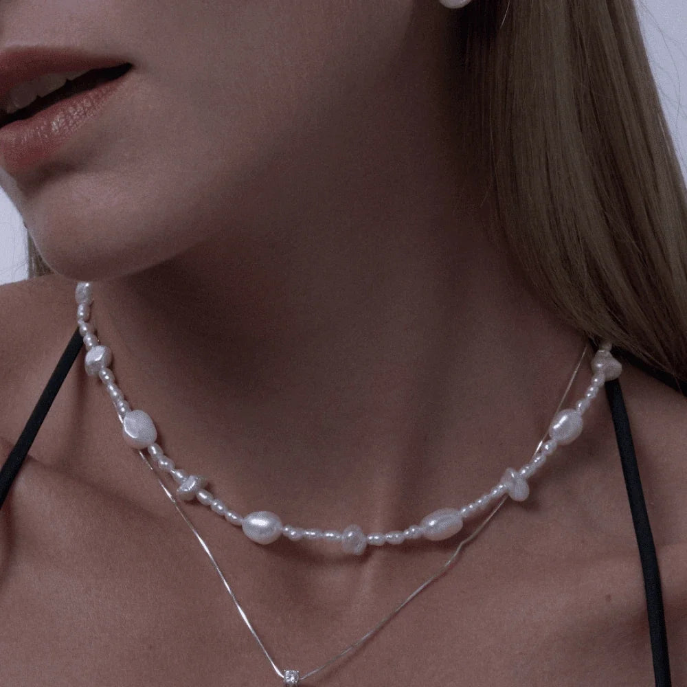 Duro | White Oval Keshi Baroque Pearl Silver Necklace model view