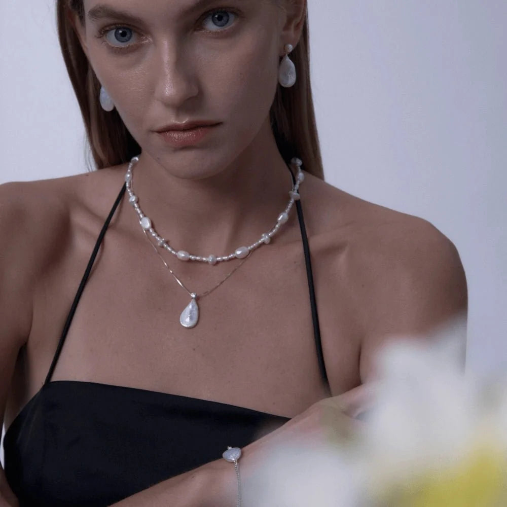 Duro | White Oval Keshi Baroque Pearl Silver Necklace model view