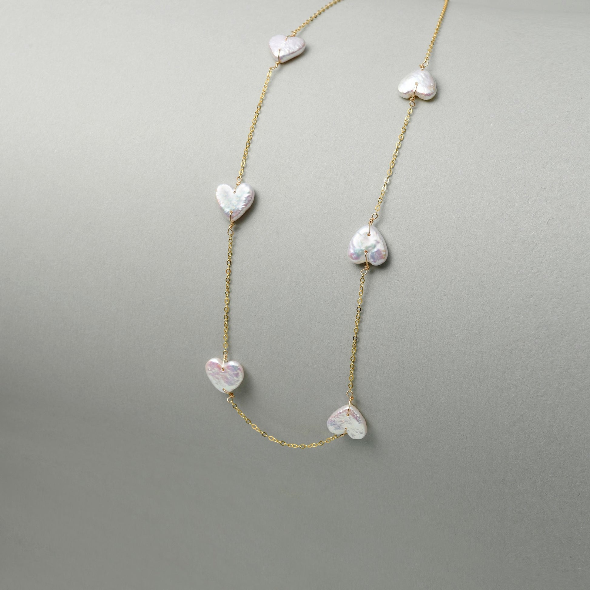 Cute necklace with heart pendant, rainbow luster necklace handmade for everyday luxury and ethereal style.