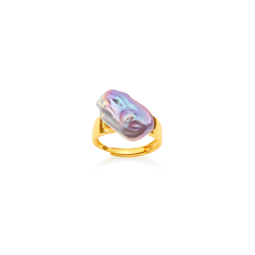 Clean white background overhead shot of 18k gold open band ring, set with one large luminous iridescent purple irregular baroque freshwater pearl focal stone