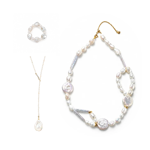 Elegant Poppy baroque pearl jewelry set with choker, lariat necklace & ring. Natural freshwater irregular pearls, 18k gold hardware, customizable chain lengths for daily & formal styling.