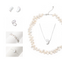 Dreamy Isla moon pearl stacking set with crescent earrings, adjustable moon ring, keshi pearl choker, moon pendant necklace & two moon bracelets. Natural freshwater baroque pearls, minimalist silver finish for delicate daily layering.