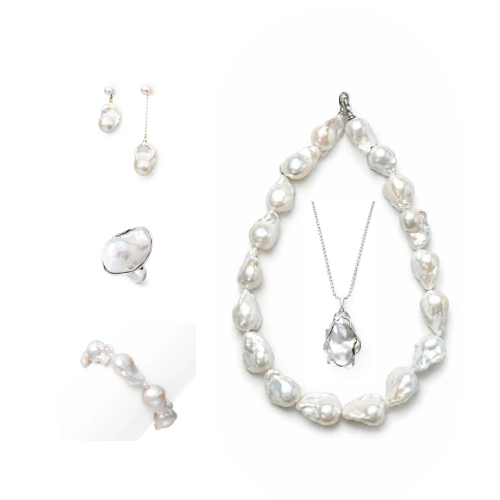 Minimal white flat lay of Imogen all-white baroque pearl sterling silver 5-piece stacking set, asymmetrical drop mismatched pearl earrings, open pearl ring, curved pearl bracelet, large irregular pearl choker & thin silver pendant necklace