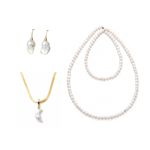 Minimal flat lay of Luna moon pearl 4-piece stacking set, baroque pearl 18k gold drop earrings, moon pearl herringbone pendant necklace, two lengths of uniform white freshwater pearl bead strands