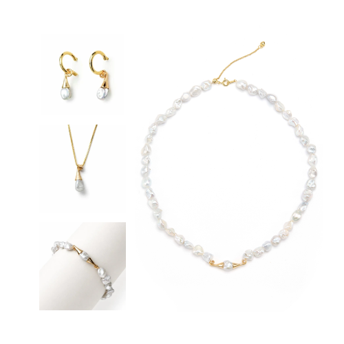 Minimal white studio flat lay of Elio mini keshi pearl 4-piece gold plated set, tiny keshi hoop drop earrings, slim snake chain keshi pendant necklace, irregular keshi pearl choker, matching delicate keshi pearl bracelet