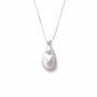 Clean white studio shot of teardrop baroque pearl silver pendant necklace, luminous organic drop white freshwater pearl with sparkling cubic zirconia top on thin polished 925 sterling silver snake chain